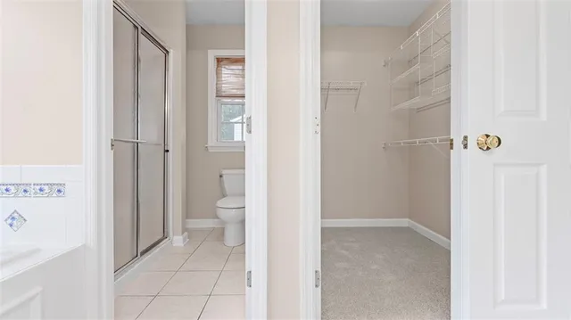 a view of a bathroom with toilet