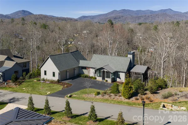 an aerial view of a house with a garden