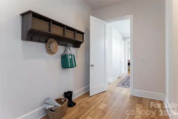 a view of entryway with wooden floor