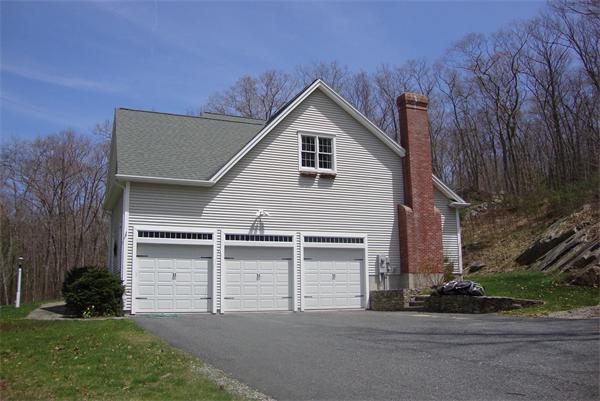 169 Manchaug Road Sutton, MA 01590 - Photo 23 of 30 a view of house and outdoor space