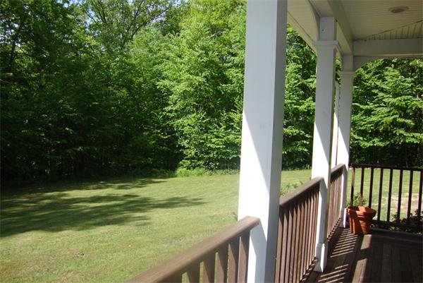 169 Manchaug Road Sutton, MA 01590 - Photo 25 of 30 a view of a balcony with an outdoor space