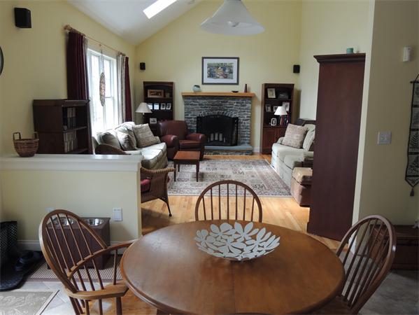 169 Manchaug Road Sutton, MA 01590 - Photo 6 of 30 a living room with furniture and a fireplace