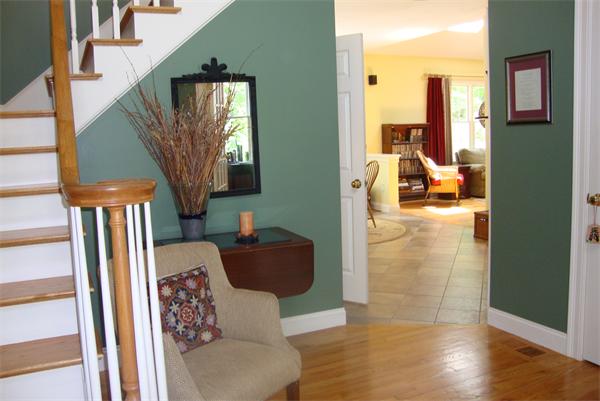 169 Manchaug Road Sutton, MA 01590 - Photo 10 of 30 a living room with furniture and a fireplace