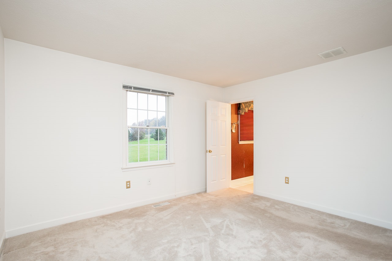 38 Spottswood Road Raphine, VA 24472 - Photo 17 of 40 an empty room with windows