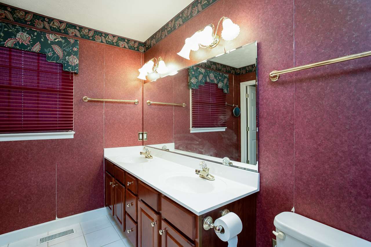 38 Spottswood Road Raphine, VA 24472 - Photo 18 of 40 a bathroom with a sink vanity and a mirror