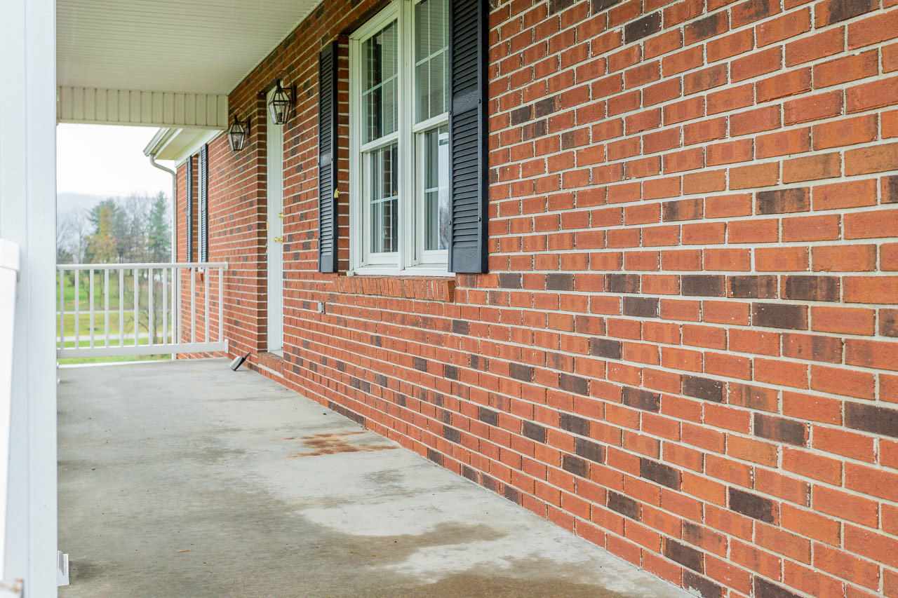 38 Spottswood Road Raphine, VA 24472 - Photo 29 of 40 a view of a brick house with a large window