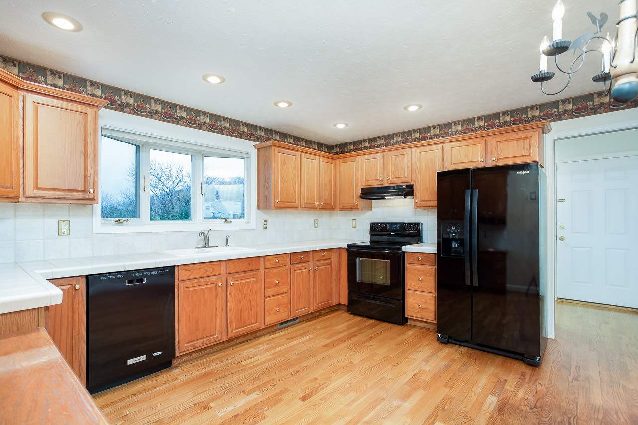 38 Spottswood Road Raphine, VA 24472 - Photo 3 of 40 a large kitchen with stainless steel appliances granite countertop a refrigerator and a sink