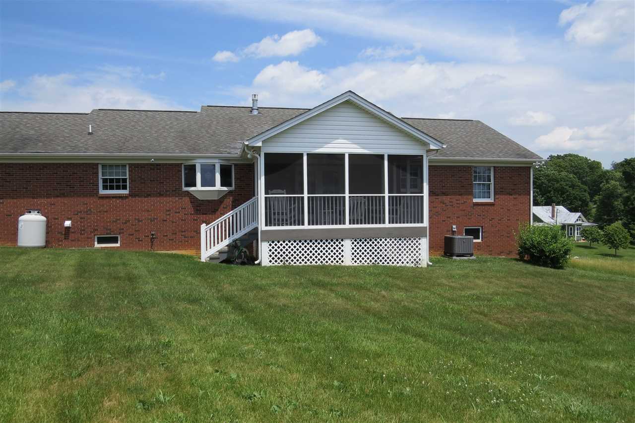 38 Spottswood Road Raphine, VA 24472 - Photo 31 of 40 a front view of a house with a yard