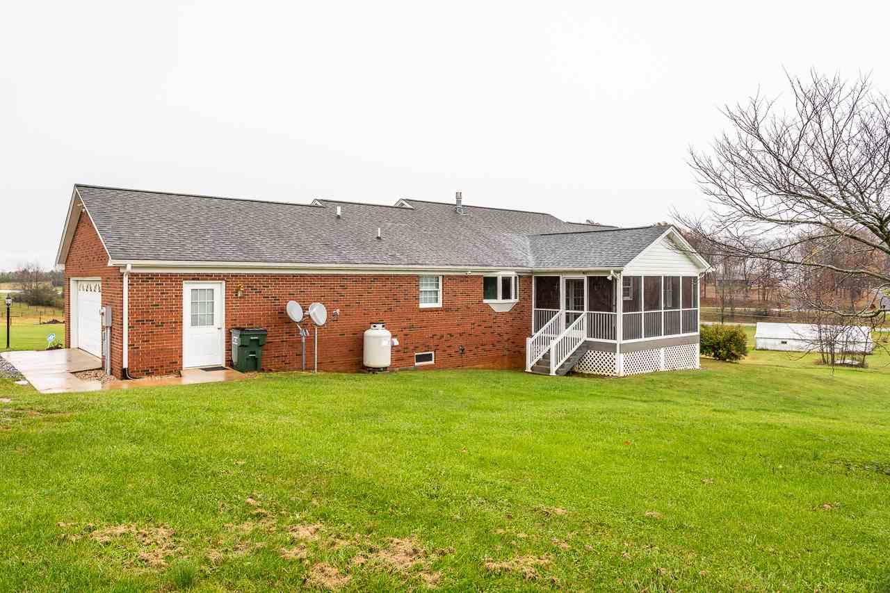 38 Spottswood Road Raphine, VA 24472 - Photo 32 of 40 a view of a house with a yard and sitting area