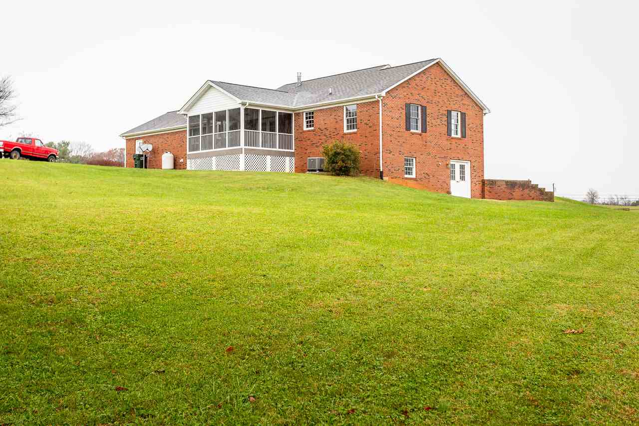 38 Spottswood Road Raphine, VA 24472 - Photo 35 of 40 a view of a house with yard and sitting area