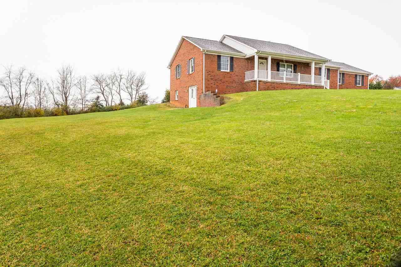38 Spottswood Road Raphine, VA 24472 - Photo 37 of 40 a front view of a house with a yard