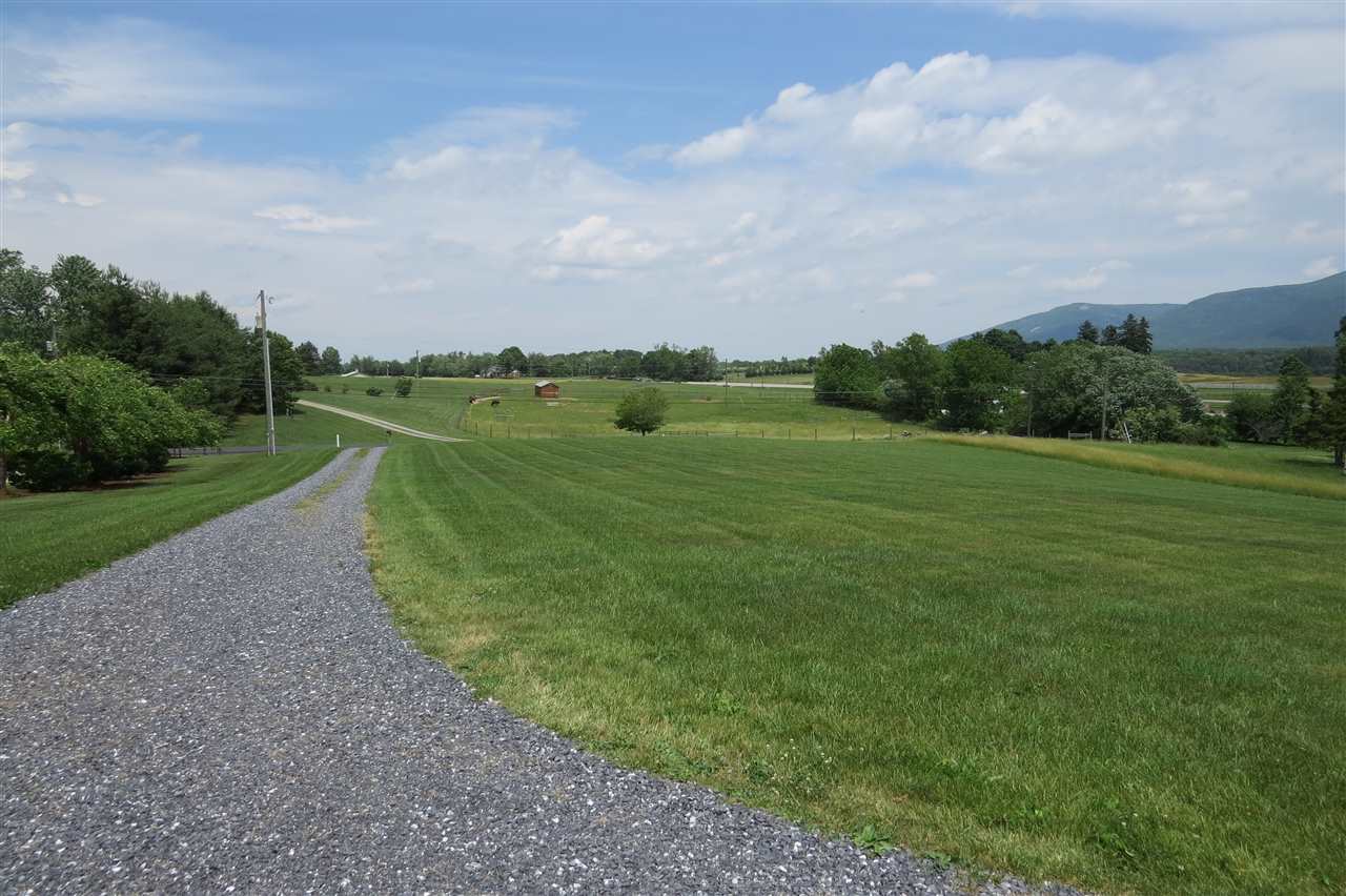 38 Spottswood Road Raphine, VA 24472 - Photo 40 of 40 a view of a golf course with a lake