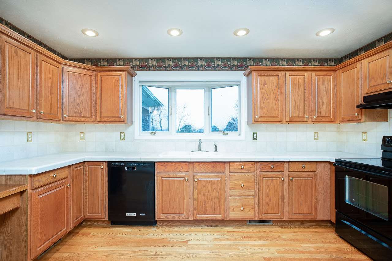 38 Spottswood Road Raphine, VA 24472 - Photo 4 of 40 a kitchen with a sink cabinets and window