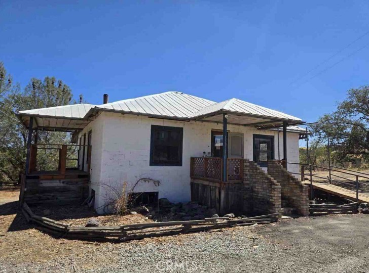 13013 Toomes Camp Road Paskenta, CA 96029 - Photo 1 of 1 a front view of a house with a yard