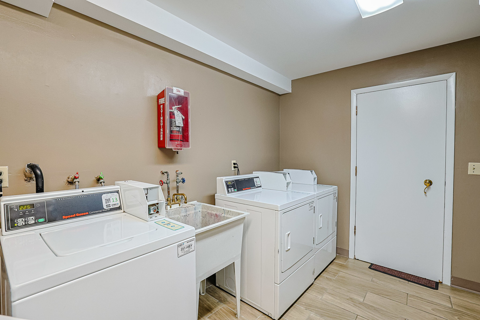 19380 Wolf Road, Unit 6 Mokena, IL 60448 - Photo 13 of 27 a utility room with dryer and washer