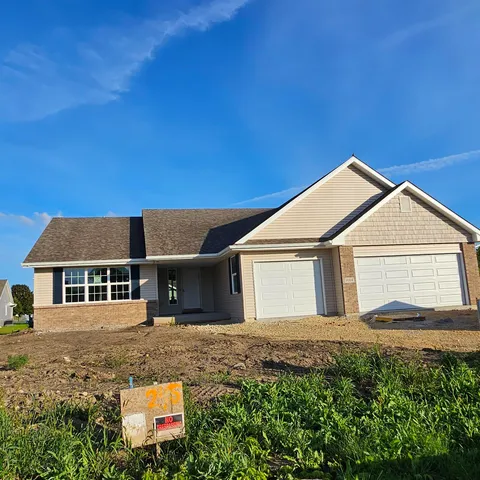 a view of a yard in front of a house