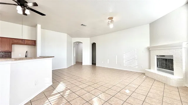 a view of an empty room and window