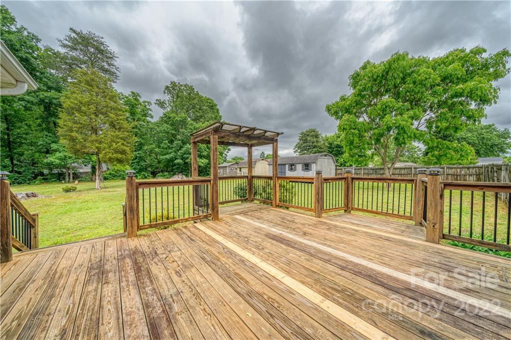 740 Rainey Road Salisbury, NC 28146 - Photo 29 of 32 a view of a balcony with wooden floor