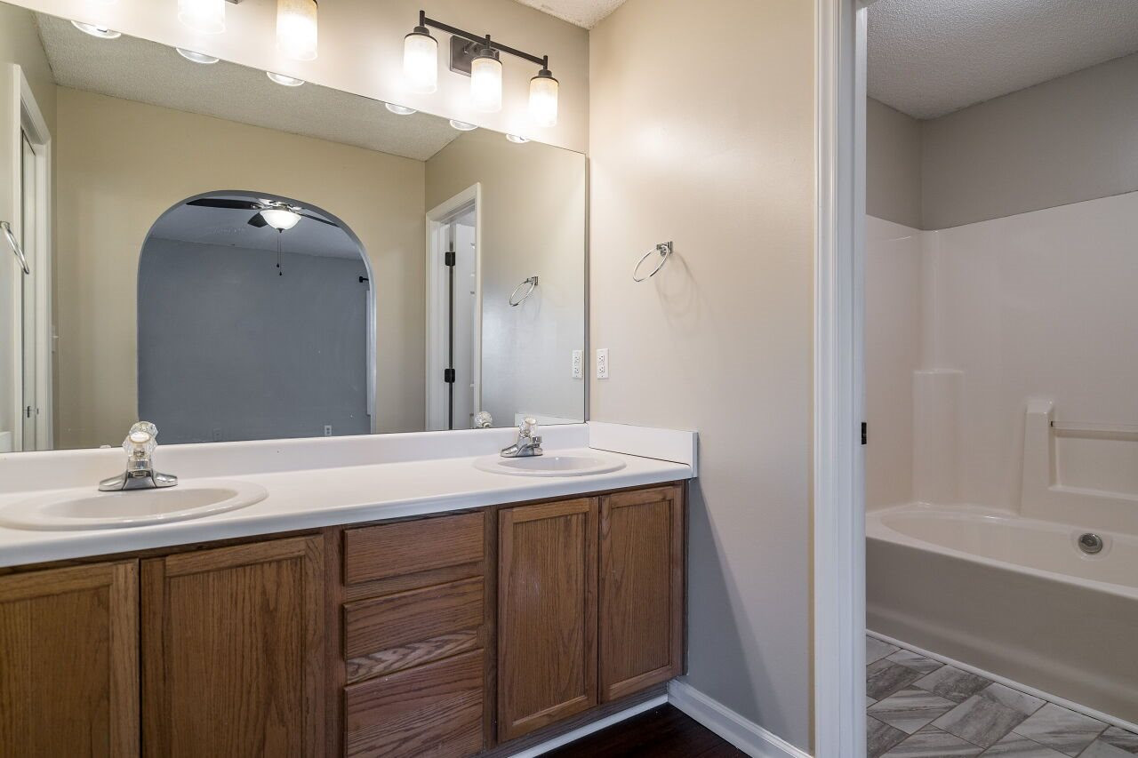 2905 Alder Ridge Lane Raleigh, NC 27603 - Photo 17 of 26 The master suite has a dual vanity and walk-in closet. Master Suite