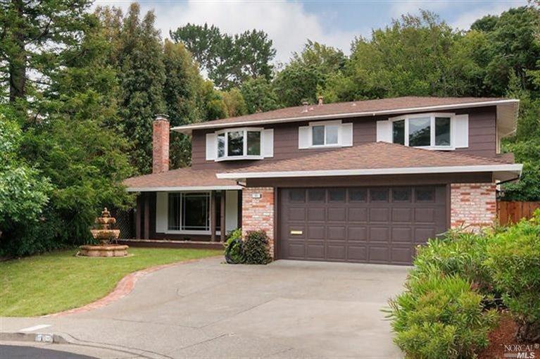11 Corte Capistrano San Rafael, CA 94903 - Photo 1 of 1 a front view of a house with a yard and trees