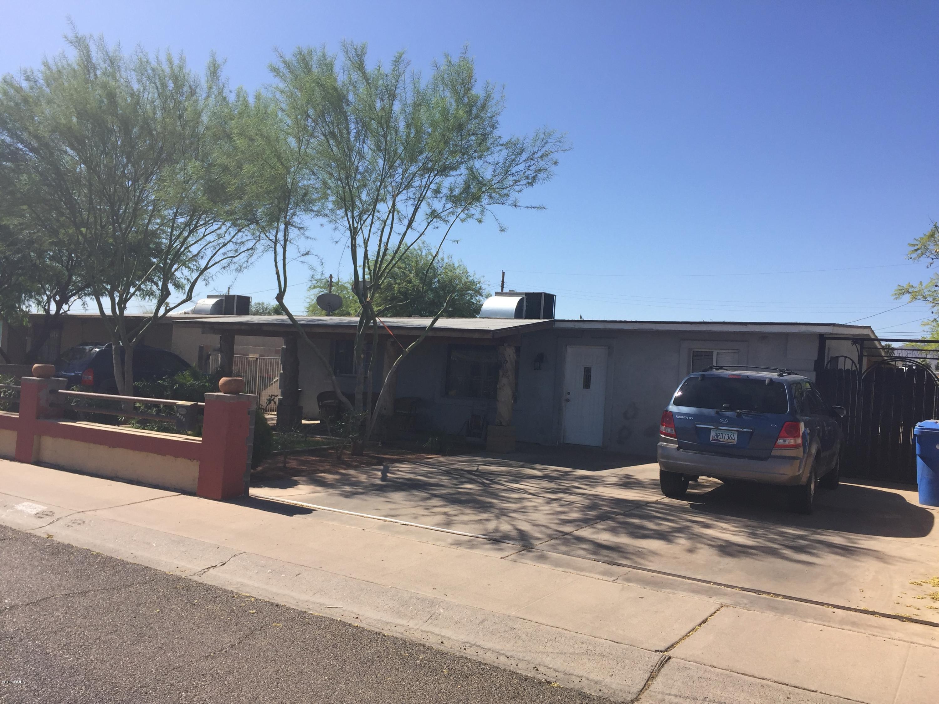 1809 West Chipman Road Phoenix, AZ 85041 - Photo 3 of 32 IMG_1042