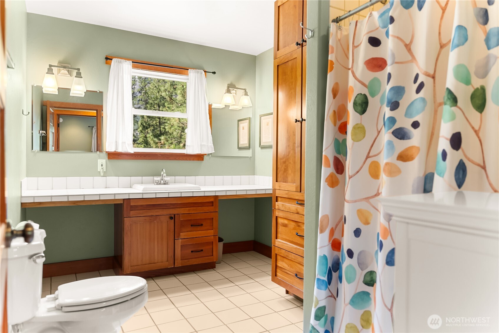 7 Last Chance Road Mazama, WA 98833 - Photo 12 of 40 a bathroom with a granite countertop sink toilet and shower