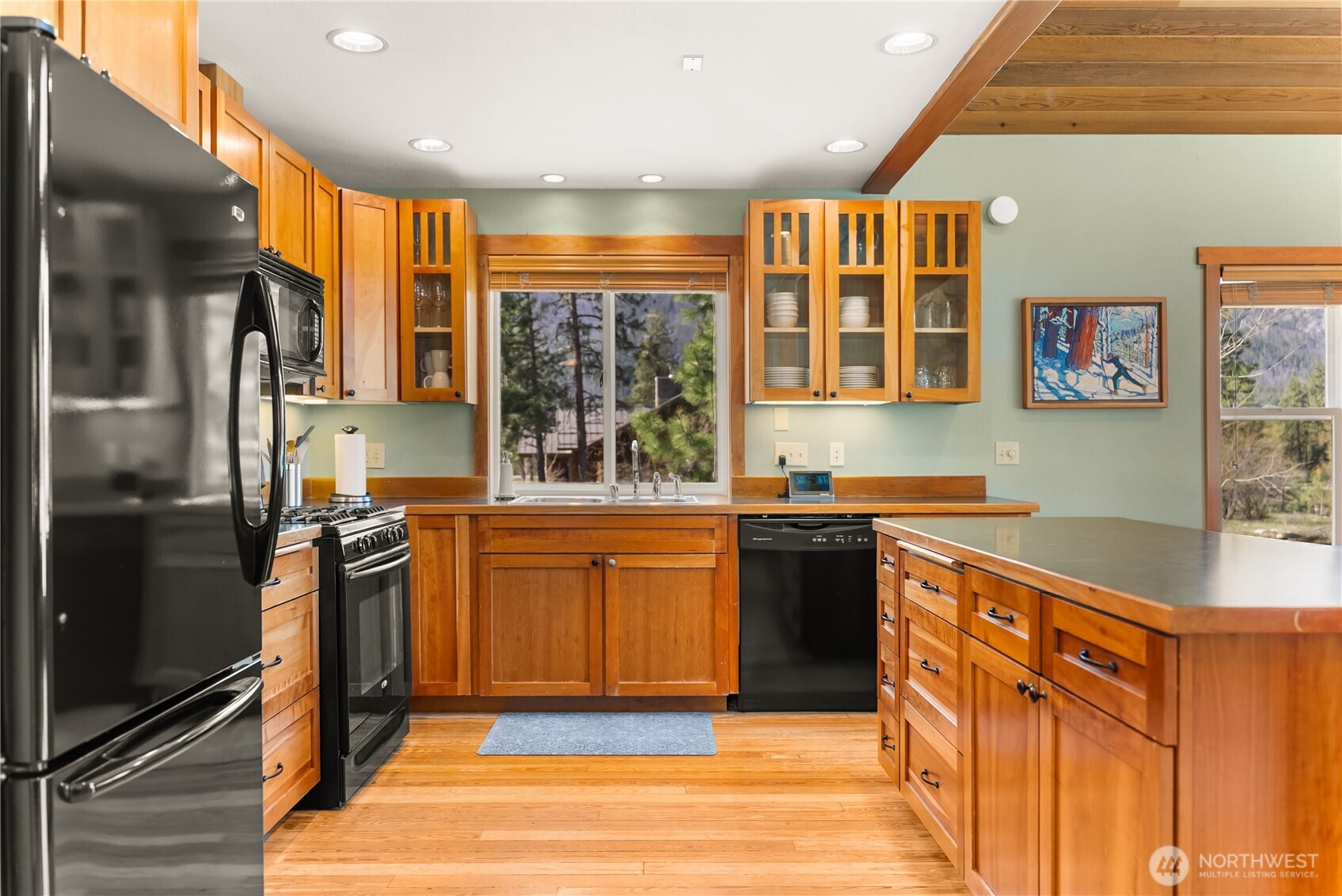 7 Last Chance Road Mazama, WA 98833 - Photo 17 of 40 a kitchen with stainless steel appliances granite countertop a refrigerator and a sink