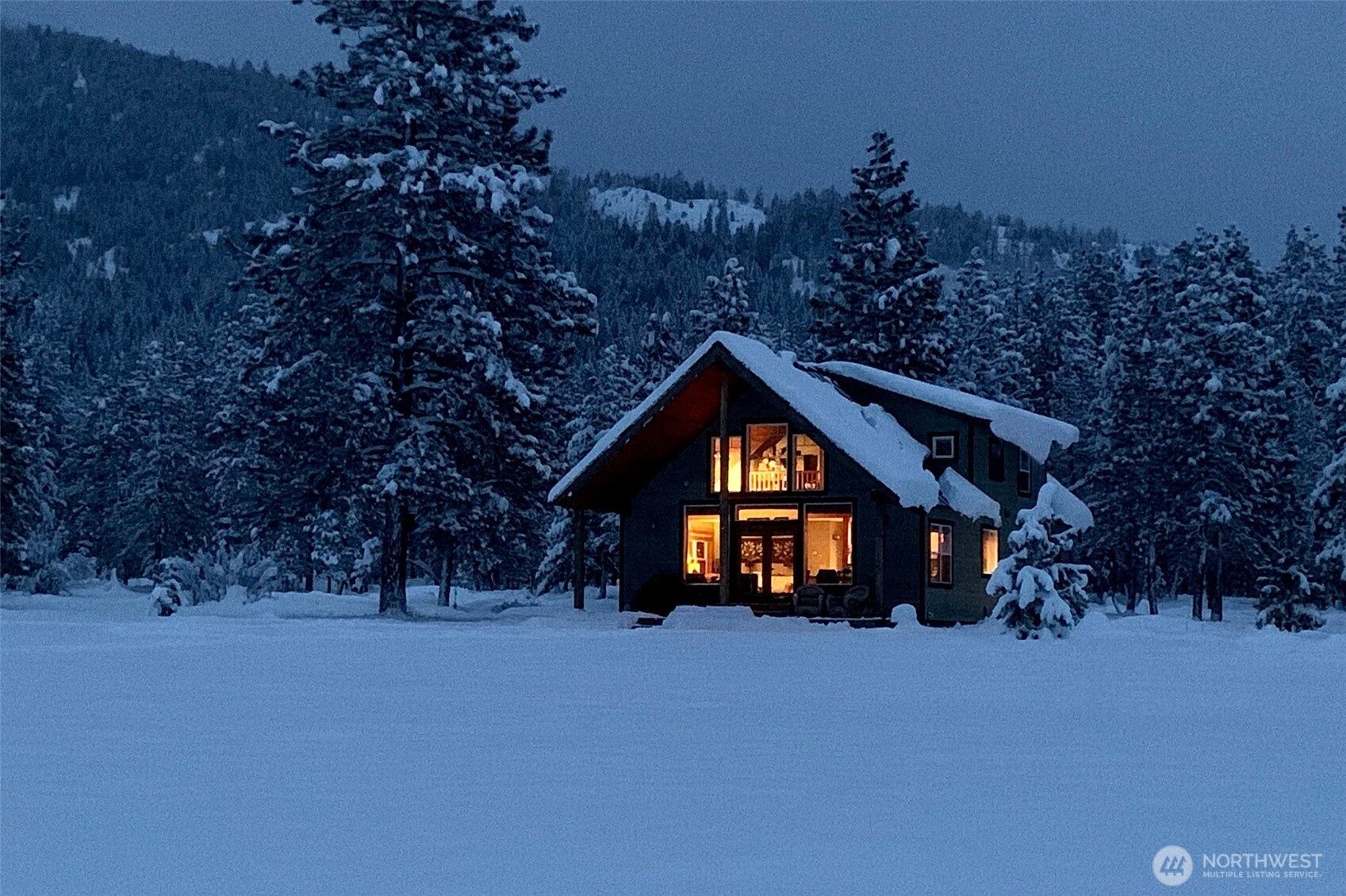 7 Last Chance Road Mazama, WA 98833 - Photo 21 of 40 a view of a house with a yard