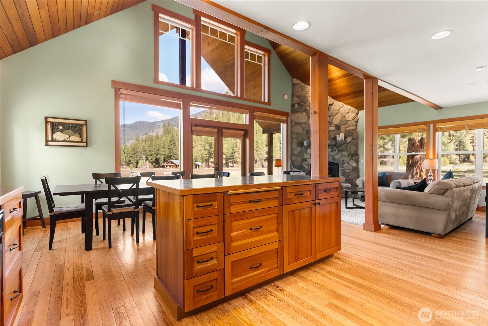 7 Last Chance Road Mazama, WA 98833 - Photo 22 of 40 a living room with furniture and a large window