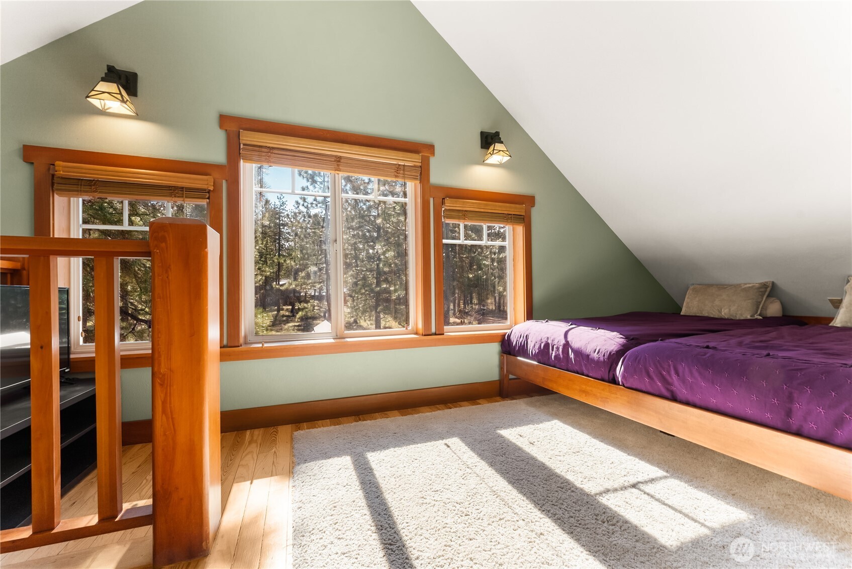 7 Last Chance Road Mazama, WA 98833 - Photo 24 of 40 a bedroom with a large bed and a large window