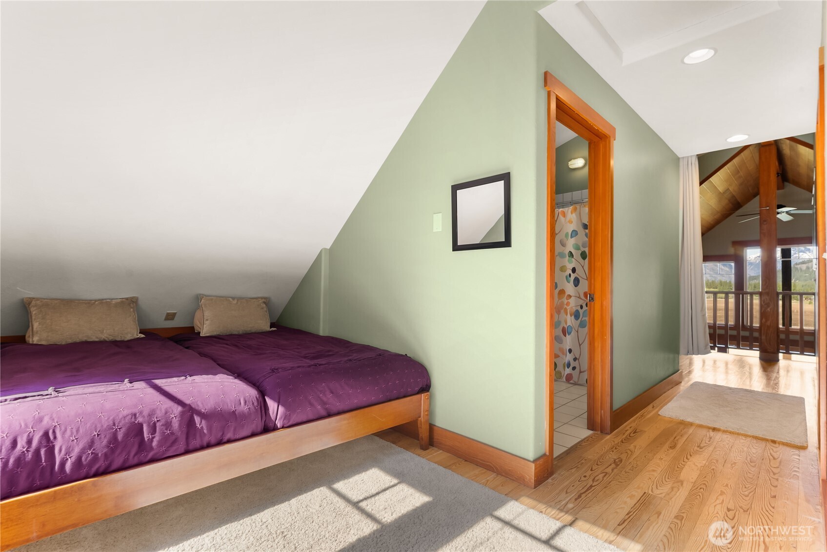 7 Last Chance Road Mazama, WA 98833 - Photo 25 of 40 a bedroom with a bed and a mirror