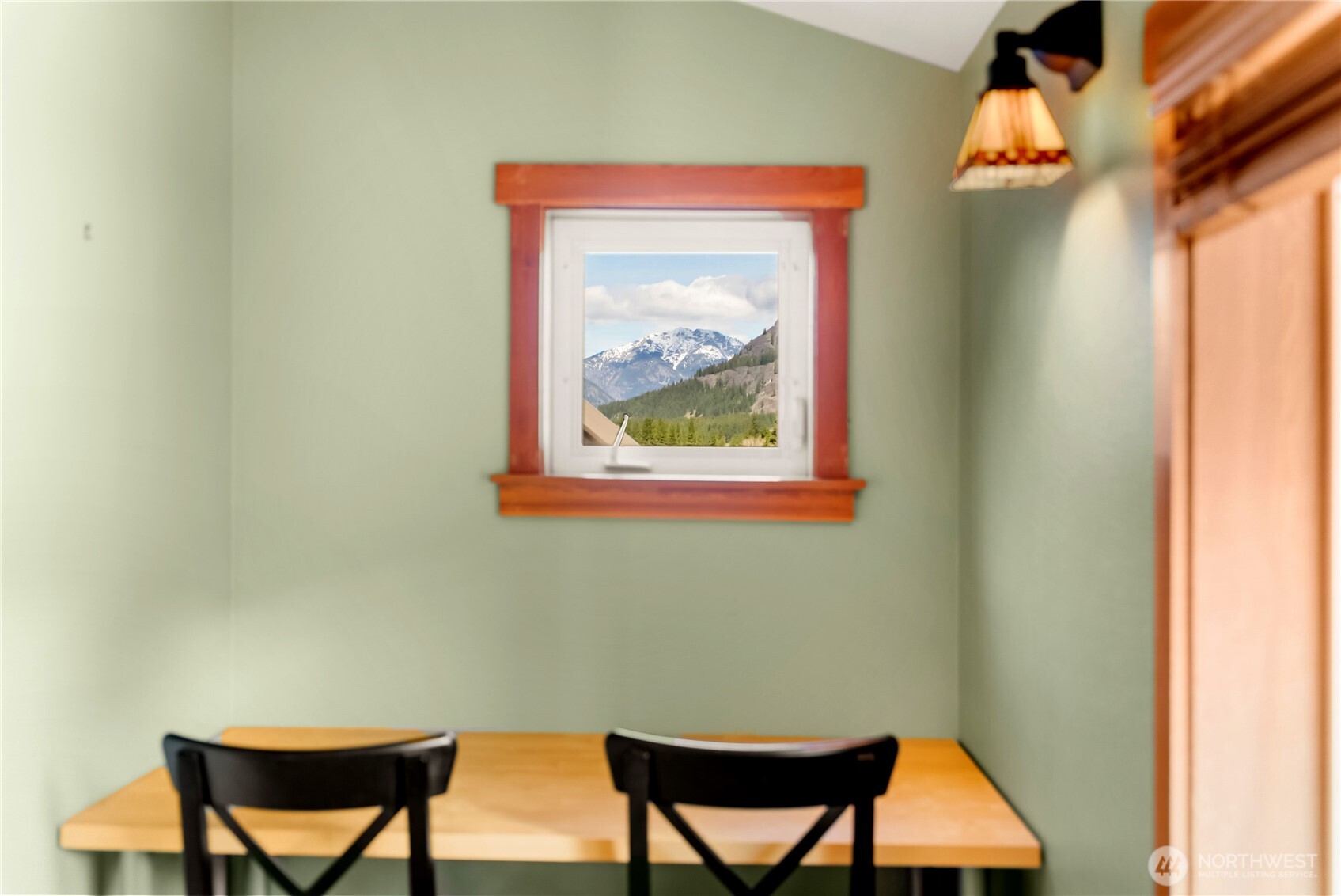 7 Last Chance Road Mazama, WA 98833 - Photo 28 of 40 a view of a room that has a table and chair