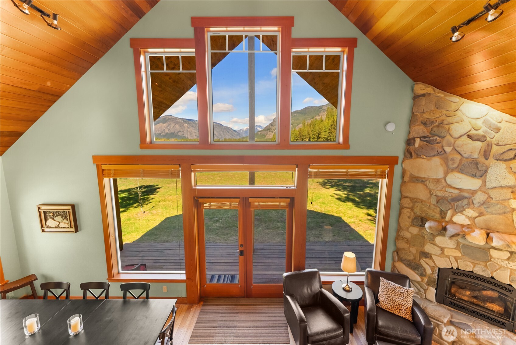 7 Last Chance Road Mazama, WA 98833 - Photo 29 of 40 a view of a balcony with chair and table