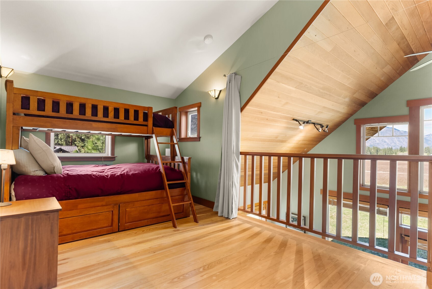 7 Last Chance Road Mazama, WA 98833 - Photo 35 of 40 a bedroom with a bed and a large window