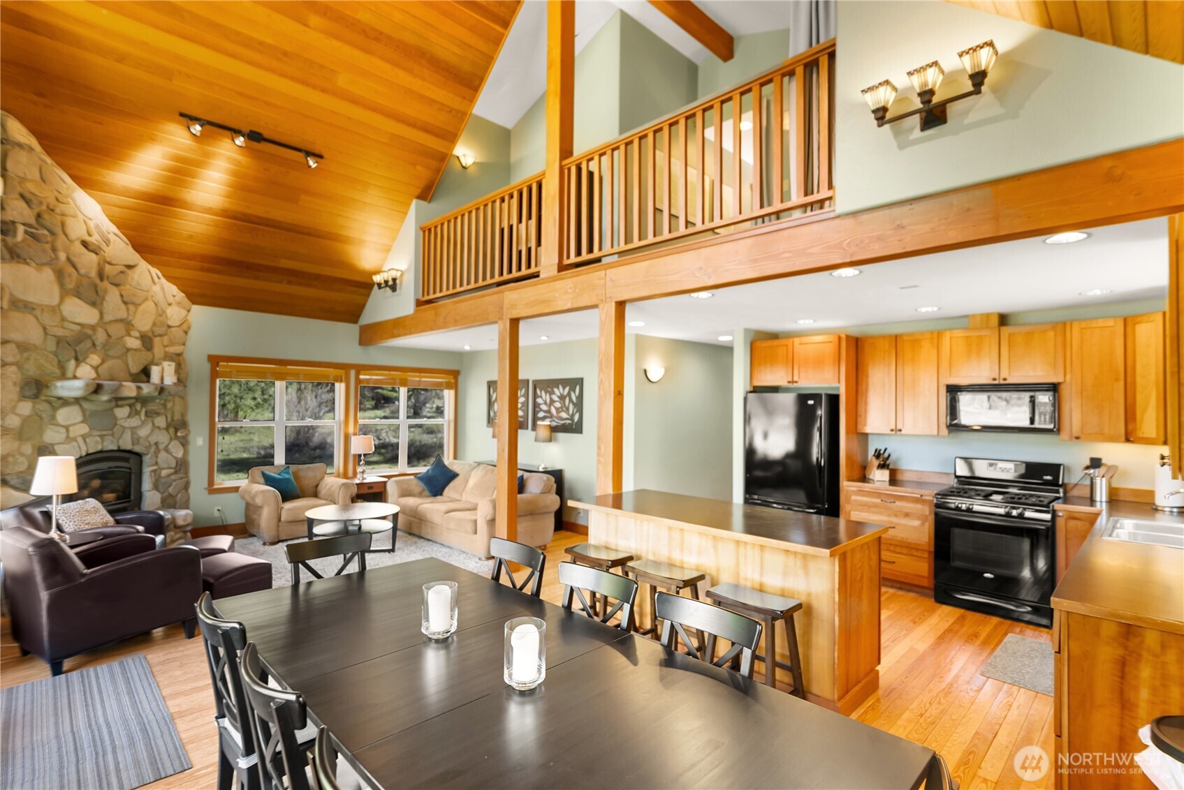 7 Last Chance Road Mazama, WA 98833 - Photo 4 of 40 a lobby with furniture and floor to ceiling windows