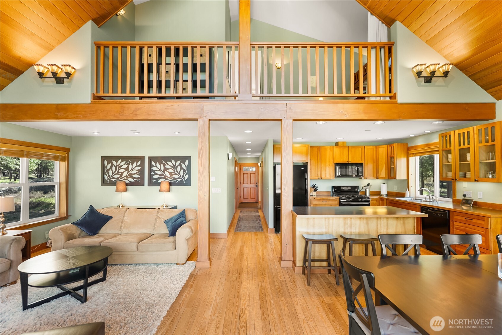 7 Last Chance Road Mazama, WA 98833 - Photo 9 of 40 a living room with furniture and a table