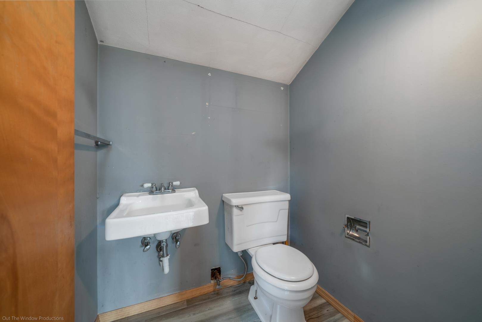 510 Elizabeth Road Oregon, IL 61061 - Photo 15 of 25 a bathroom with a toilet sink and mirror