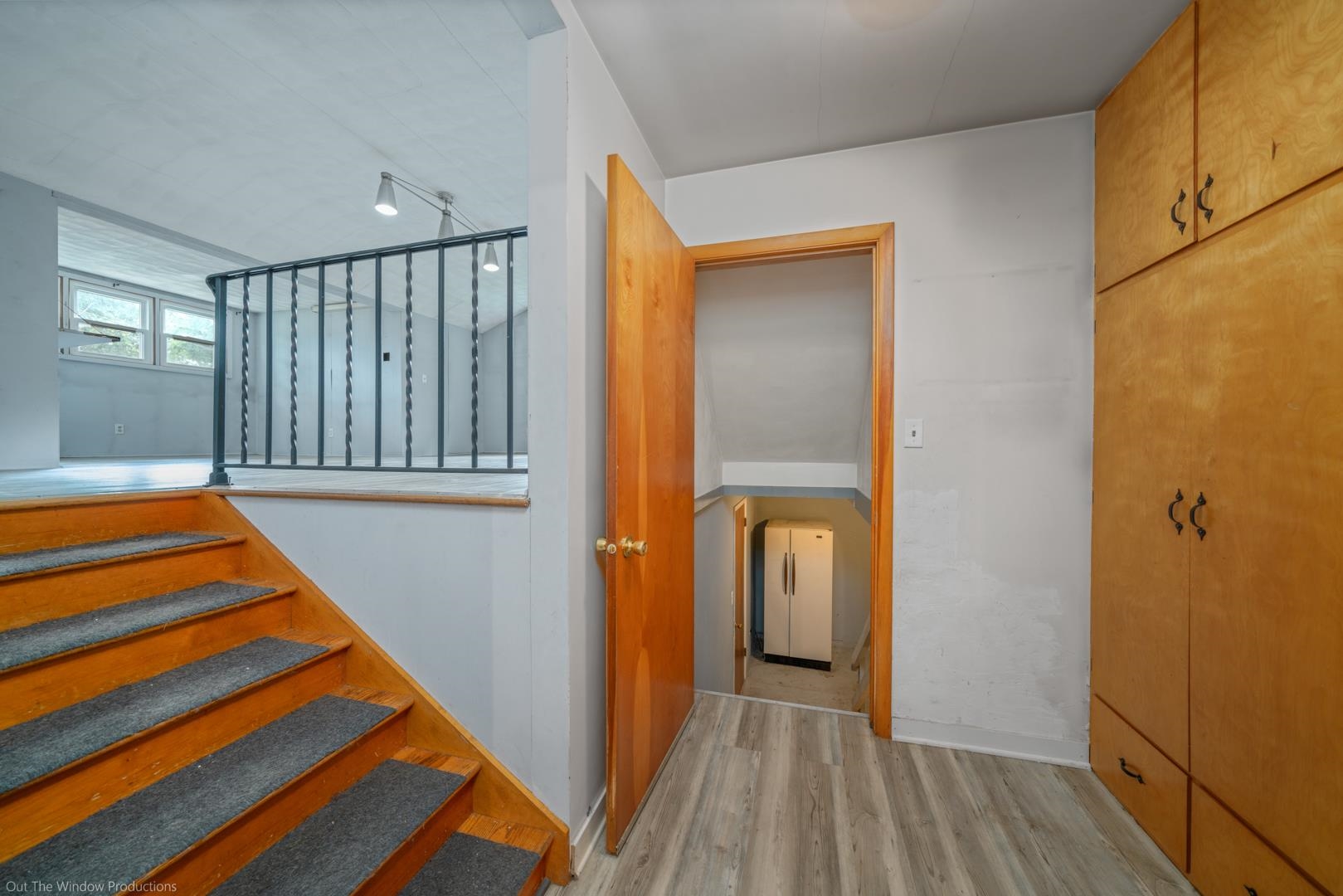 510 Elizabeth Road Oregon, IL 61061 - Photo 16 of 25 a view of a room with wooden floor and stairs