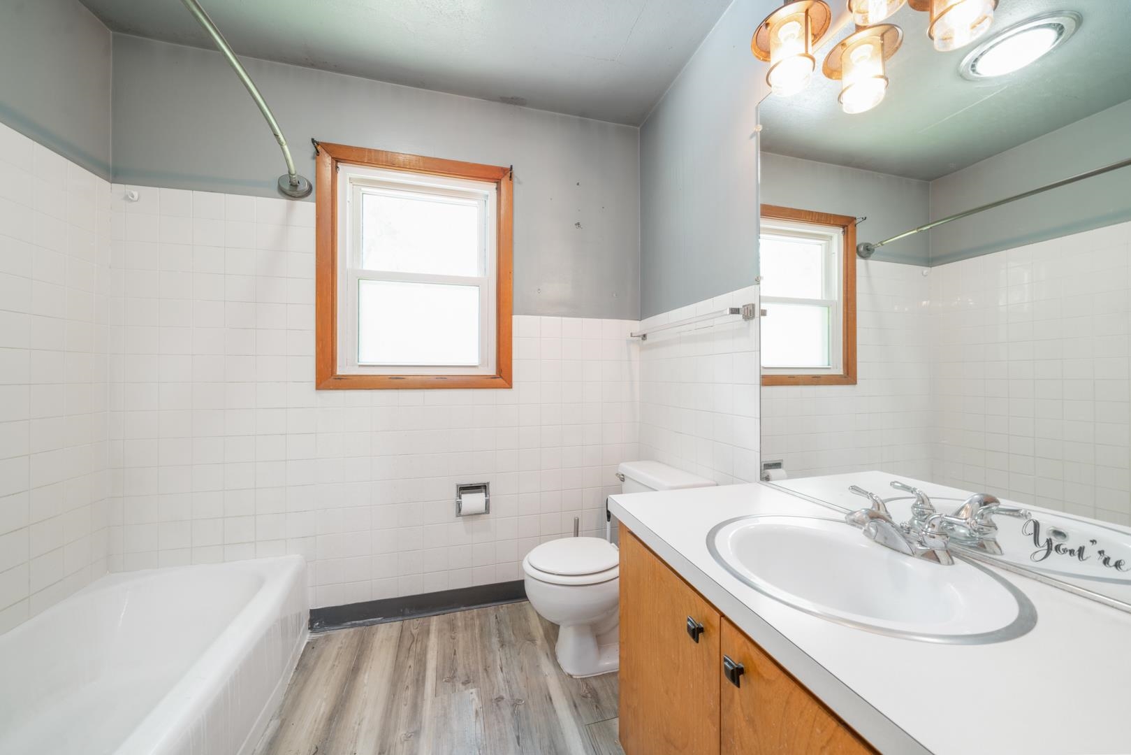 510 Elizabeth Road Oregon, IL 61061 - Photo 19 of 25 a bathroom with a sink a toilet and a bathtub