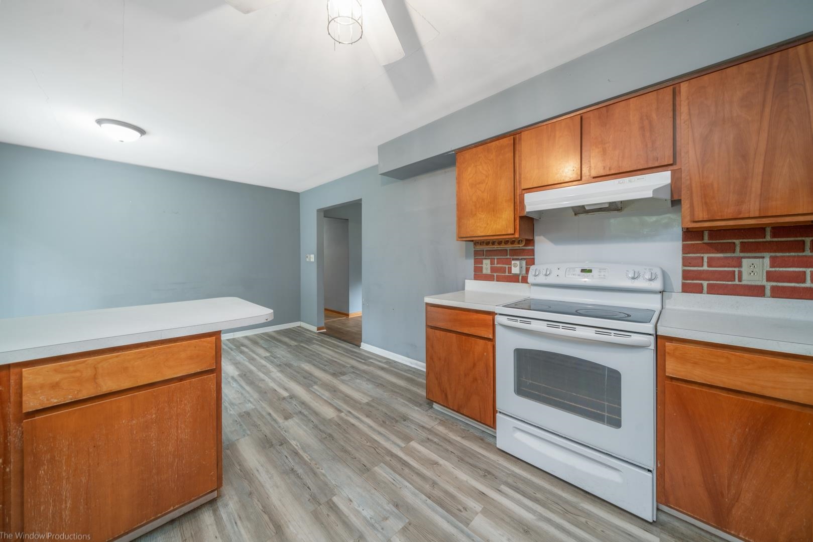 510 Elizabeth Road Oregon, IL 61061 - Photo 2 of 25 a kitchen with stainless steel appliances granite countertop a stove a sink and a refrigerator