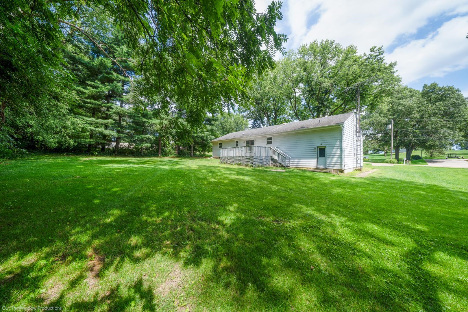 510 Elizabeth Road Oregon, IL 61061 - Photo 22 of 25 a house view with a garden space
