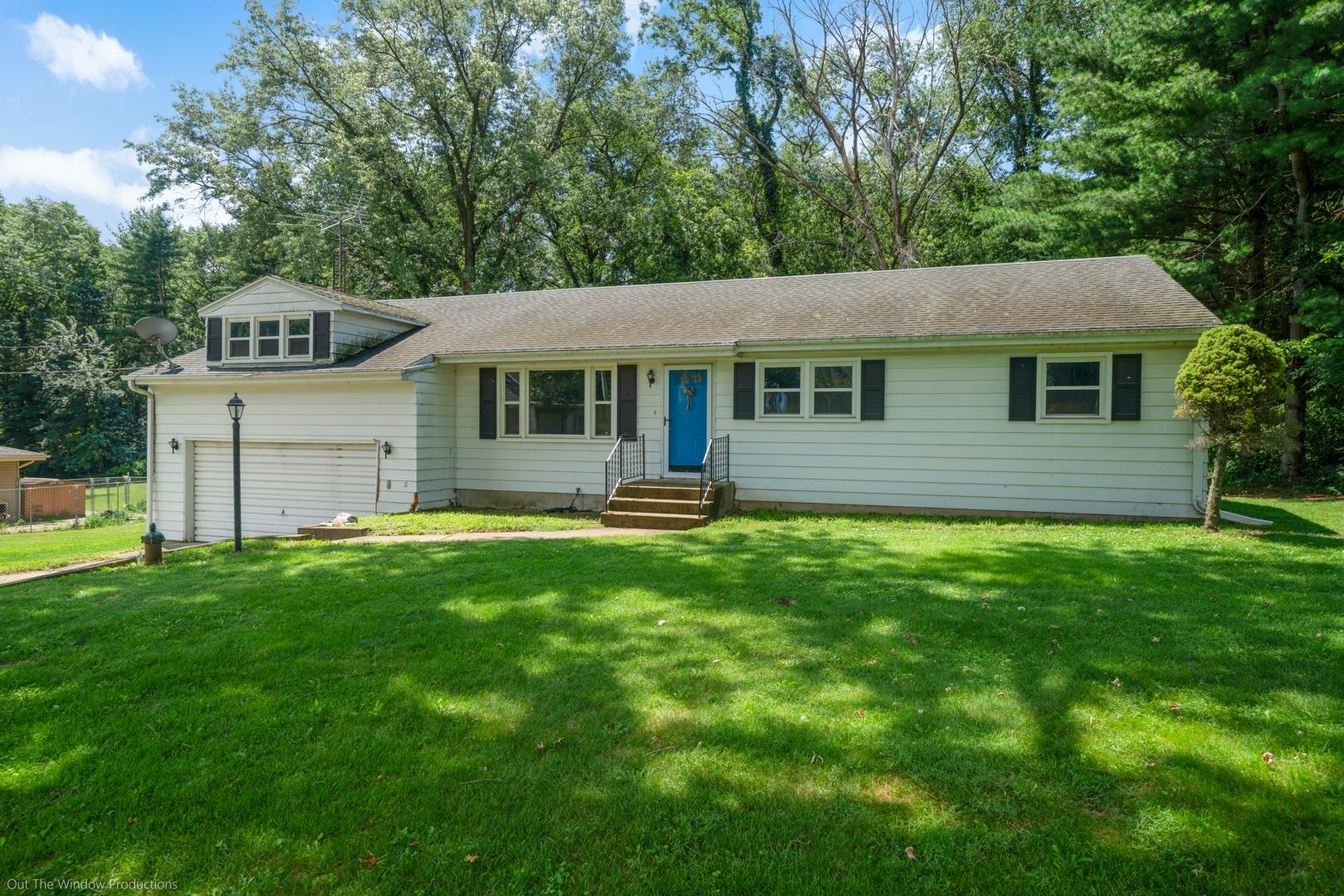510 Elizabeth Road Oregon, IL 61061 - Photo 24 of 25 a front view of a house with a yard