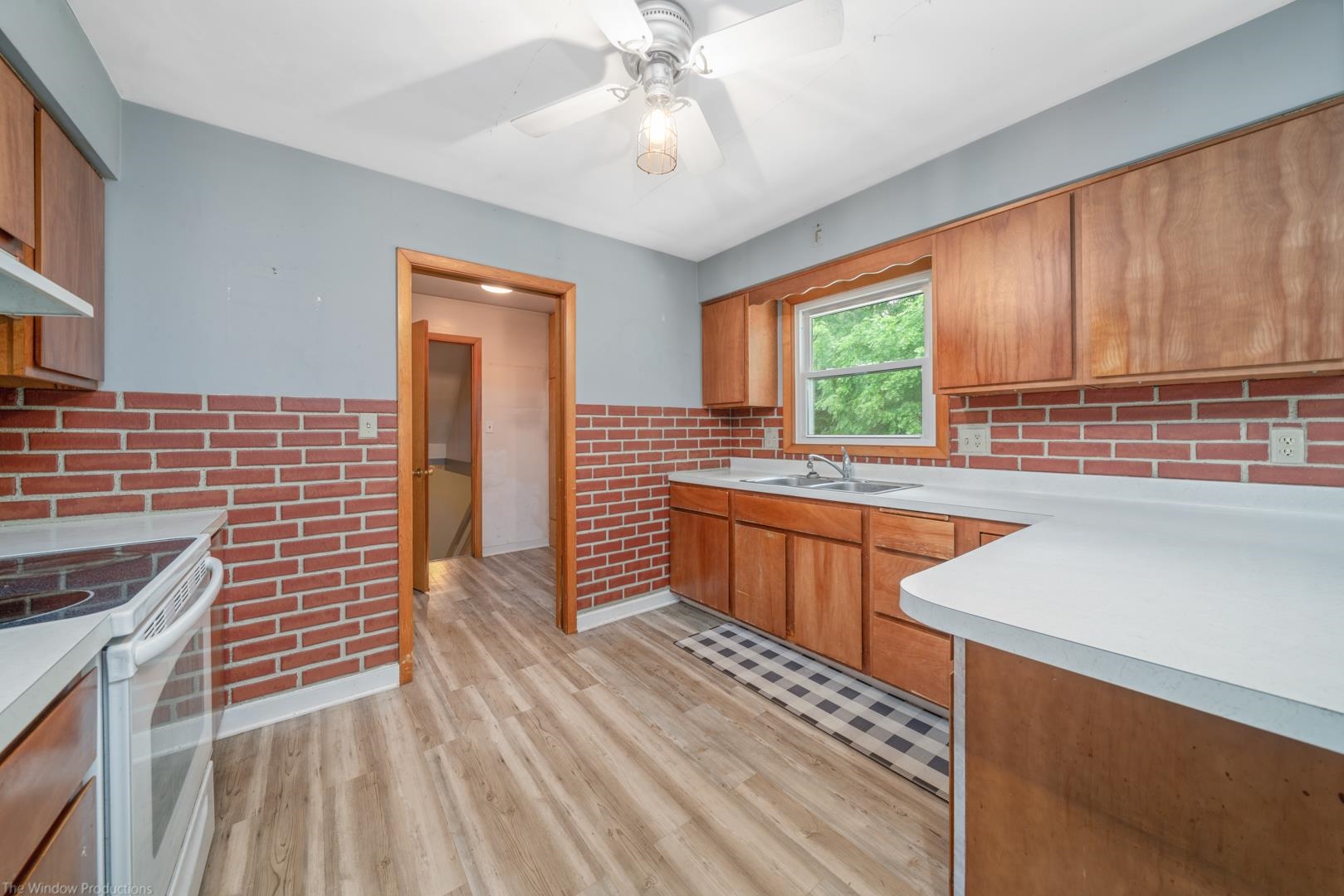 510 Elizabeth Road Oregon, IL 61061 - Photo 3 of 25 a kitchen with stainless steel appliances granite countertop a sink stove and cabinets