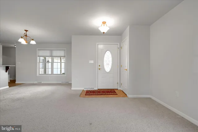 a view of a livingroom with a staircase