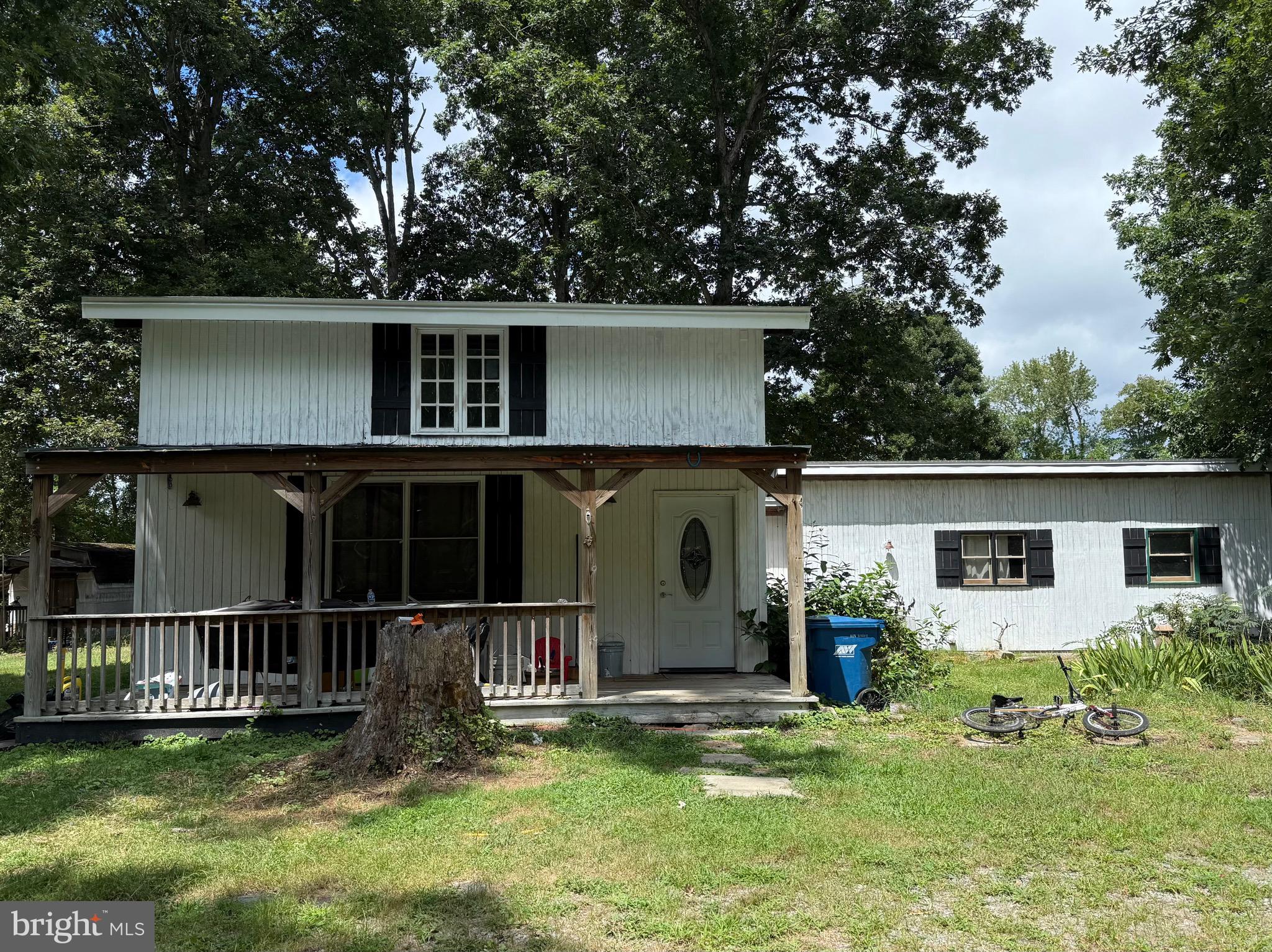 1915 Bumpass Road Bumpass, VA 23024 - Photo 1 of 17 a front view of house with yard and trees in the background