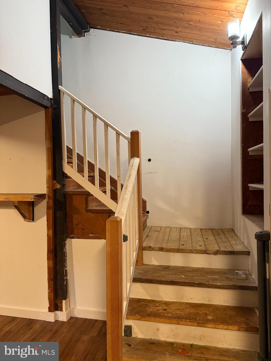 1915 Bumpass Road Bumpass, VA 23024 - Photo 16 of 17 a view of staircase with white walls and a window