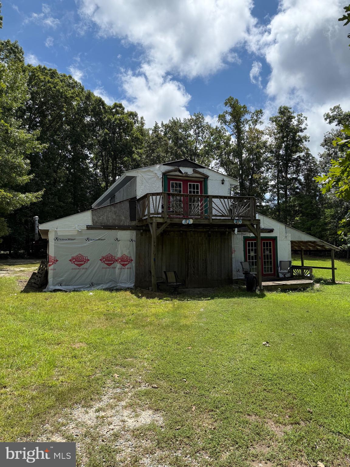 1915 Bumpass Road Bumpass, VA 23024 - Photo 2 of 17 a view of a house with a yard