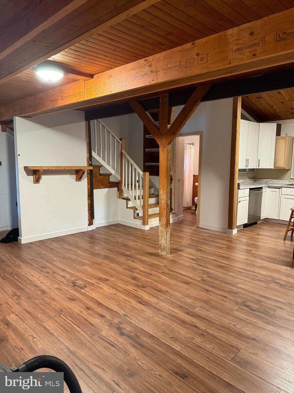 1915 Bumpass Road Bumpass, VA 23024 - Photo 6 of 17 a view of empty room with wooden floor
