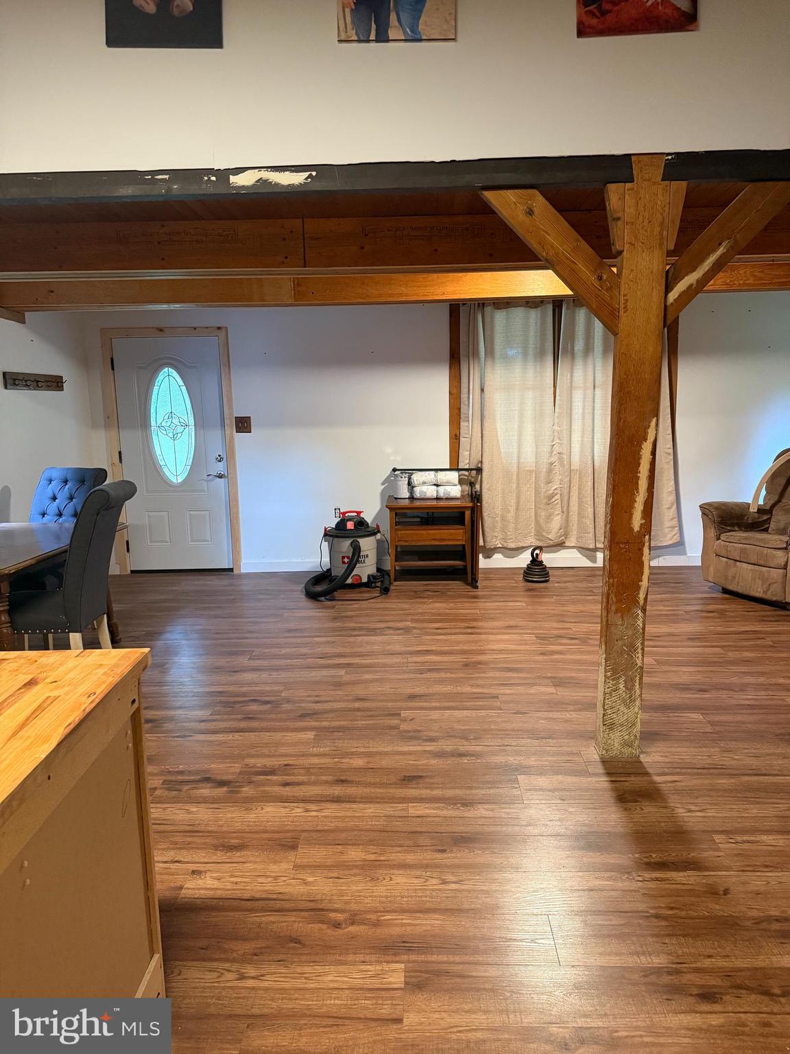 1915 Bumpass Road Bumpass, VA 23024 - Photo 7 of 17 a view of a room with wooden floor