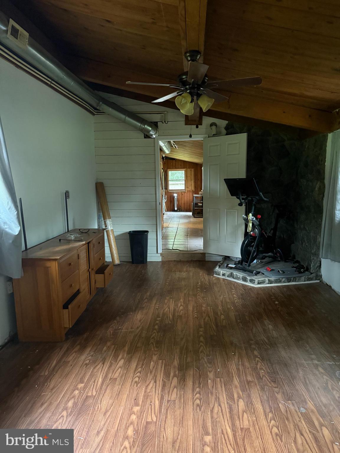 1915 Bumpass Road Bumpass, VA 23024 - Photo 10 of 17 a view of empty room with wooden floor